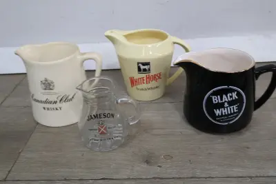 Set van 4 whisky kannen – kavel bij GSD Auctions, Zoeterwoude