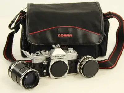 Praktica MTL 3 analoge spiegelreflexcamera met 2 objectieven – kavel bij De Kringwinkel, Antwerpen