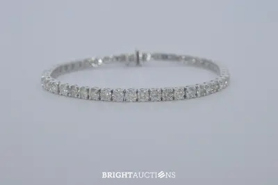 Witgouden tennisarmband met natuurlijke diamanten – kavel bij Bright Auctions