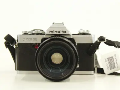 Minolta XG-9 35mm SLR met MD Zoom Rokkor 35-70mm f/3.5 & Hoya UV-filter – kavel bij De Kringwinkel, Antwerpen