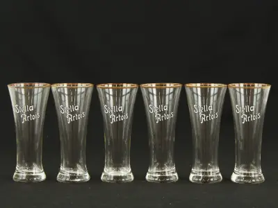 Stella Artois set van 6 vintage fluitjes glazen met goudkleurige rand jaren 60 – kavel bij De Kringwinkel, Antwerpen