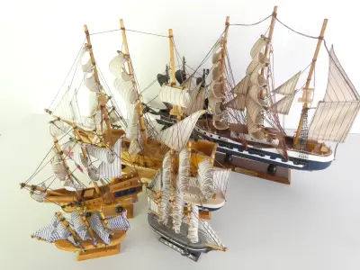 Set van 7 decoratieve houten modelzeilschepen – kavel bij De Kringwinkel, Heverlee