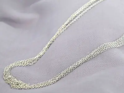 Leo Pizzo - Witgouden ketting met drie lagen – kavel bij Onlineveilingmeester