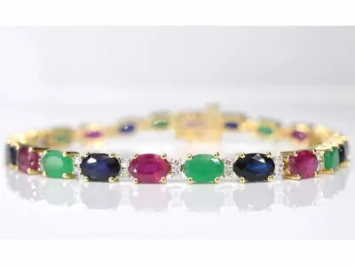 Gouden tennisarmband met diamanten, saffier, robijn en smaragd – kavel bij Onlineveilingmeester