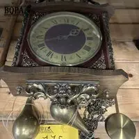 Wandklok met koperen gewichten – kavel bij BOPA Auctions, Oekene