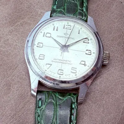 Vintage Continental Swiss Time mechanisch horloge – kavel bij Onlineveilingmeester