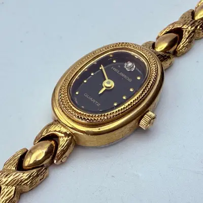 Helbros goldplated dameshorloge met diamant – kavel bij Onlineveilingmeester