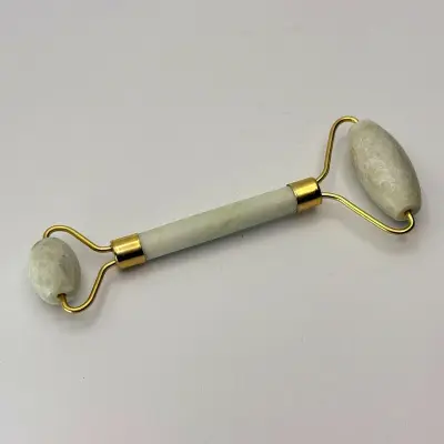 Jade massageroller met goldplating – kavel bij Onlineveilingmeester
