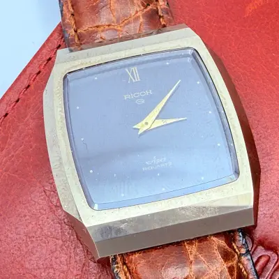 Vitage Ricoh Apex Riquartz Horloge – kavel bij Onlineveilingmeester
