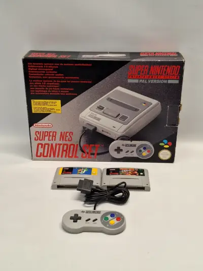 Originele Super Nintendo Entertainment System (SNES) PAL - compleet met doos, 2 controllers & 2 klassiekers – kavel bij De Kringwinkel, Gent