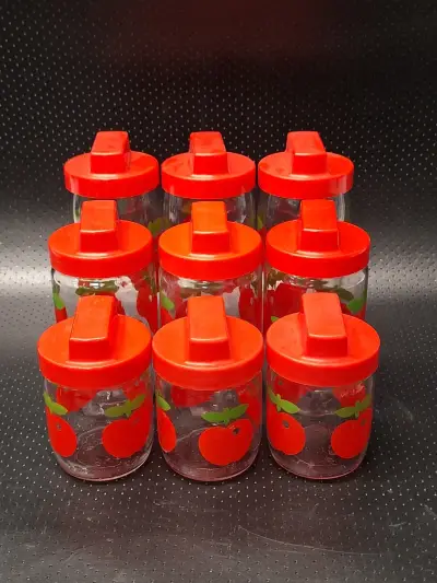 Set van 9 vintage Gulf appel voorraadpotten geproduceerd door Verreries Mécaniques Champenoises France (VMC) – kavel bij De Kringwinkel, Gent