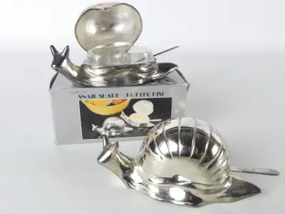 Set van 2 vintage slakvormige botervlootjes – kavel bij De Kringwinkel, Heverlee
