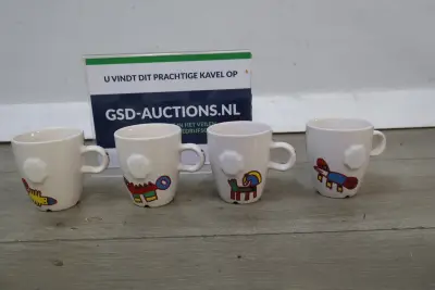 Set van 4 D.E. espresso kopjes met kleurrijke print – kavel bij GSD Auctions, Zoeterwoude