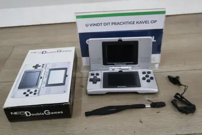 NEO Double Games handheld gameconsole – kavel bij GSD Auctions, Zoeterwoude