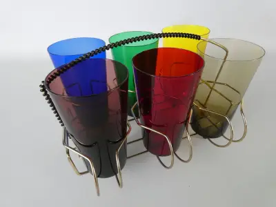 Vintage gekleurde longdrinkglazen met metalen draaghouder – 6 kleuren – Tomado Holland – kavel bij De Kringwinkel, Heverlee