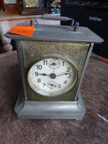 Reisklok met sleutel H18cm JUNGHAUS – kavel bij Openbare Verkopen, Izegem