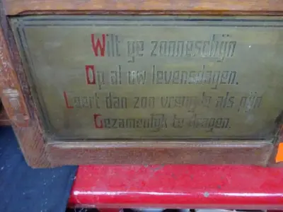 Koperen spreuk – kavel bij Openbare Verkopen, Izegem