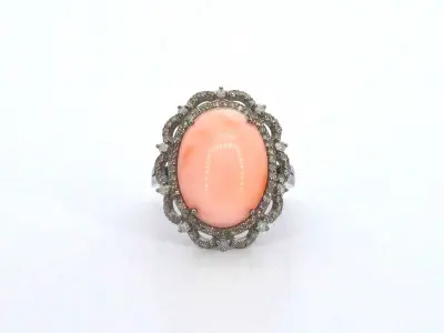 Unieke ring met diamanten en centraal koraal – kavel bij Onlineveilingmeester
