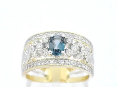 Gouden exclusieve ring vol met diamanten en een edelsteen – kavel bij Onlineveilingmeester