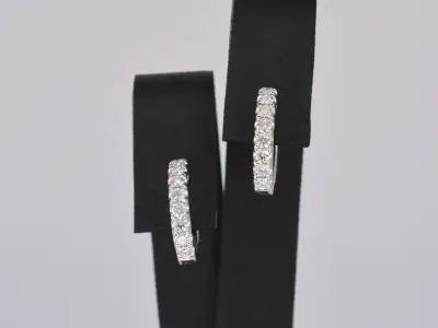Witgouden oorbellen met diamanten – kavel bij Onlineveilingmeester