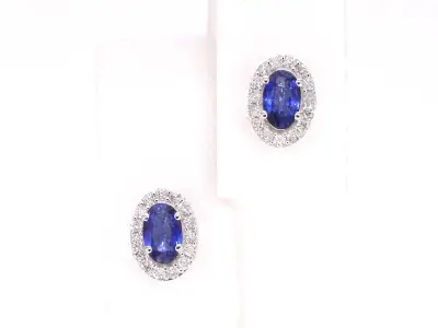 Witgouden oorbellen met diamanten en saffier – kavel bij Onlineveilingmeester