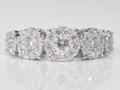 Witgouden rijring met 5 diamanten entourages 1.00 carat – kavel bij Onlineveilingmeester