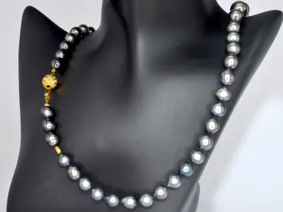 Schoeffel - Tahiti parel ketting met gouden diamanten sluiting – kavel bij Onlineveilingmeester