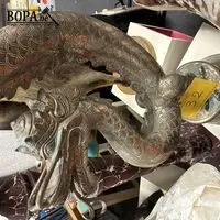 Oosters gebogen drakenkandelaar – kavel bij BOPA Auctions, Ieper