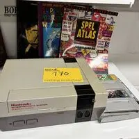 Lot Nintendo console/spellen/boeken – kavel bij BOPA Auctions, Ieper