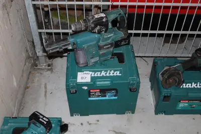 Accu boorhamer MAKITA DHR242 met HEPA DX01 afzuiger met accu en kunststoffen koffer – kavel bij HNVI, 's-Hertogenbosch