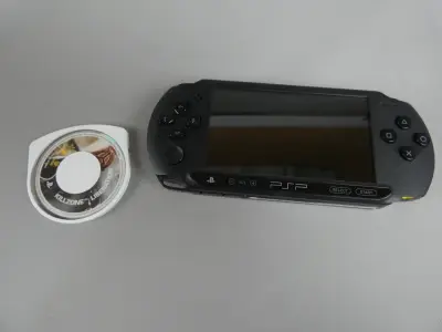 PSP met Killzone liberation en lader – kavel bij De Kringwinkel, Diest
