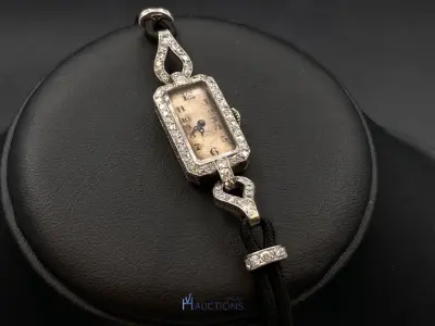 Antiek dameshorloge bezet met diamant – kavel bij VH Auctions