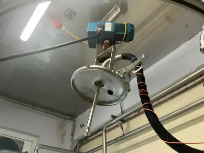 Demag Chain hoist with barrel cleaner nossle – kavel bij Dome Auctions, Neuss