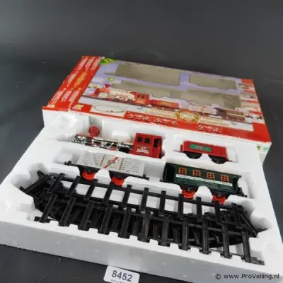 Goldlok Holiday Express / L'Express des Vacances (12-delige kersttreinset, batterij-aangedreven met licht en muziek – kavel bij ProVeiling