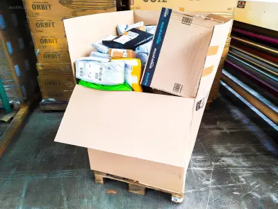 Pallet Postpakketten 128 kg – kavel bij Auctim
