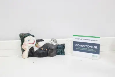 Keramische liggende kabouter met hond' – kavel bij GSD Auctions, Zoeterwoude