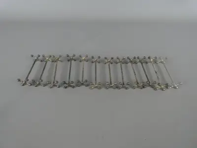 Set van 12 verzilverde messenleggers met decoratieve uiteinden – kavel bij De Kringwinkel, Diest