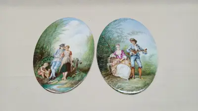 Set van 2 ovale porseleinen wandborden met schilderingen – kavel bij De Kringwinkel, Zottegem