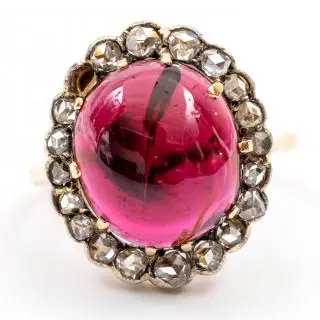 A garnet and diamond cluster ring – kavel bij Veilinggebouw De Zwaan, Amsterdam