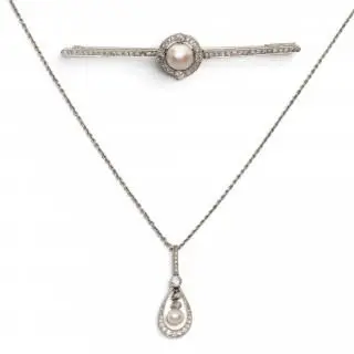 An Art Deco pearl and diamond brooch and pendant – kavel bij Veilinggebouw De Zwaan, Amsterdam