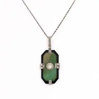 An Art Deco octagonal jade and diamond pendant – kavel bij Veilinggebouw De Zwaan, Amsterdam