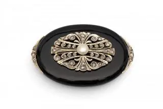 An onyx and diamond brooch – kavel bij Veilinggebouw De Zwaan, Amsterdam