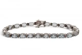 A French topaz and diamond line bracelet – kavel bij Veilinggebouw De Zwaan, Amsterdam
