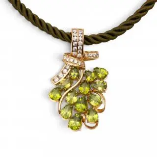 A diamond and peridot pendant – kavel bij Veilinggebouw De Zwaan, Amsterdam