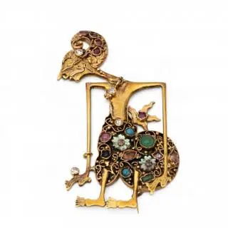 An Indonesian gem set Wayang brooch and pendant – kavel bij Veilinggebouw De Zwaan, Amsterdam