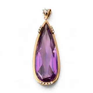 A large drop-shaped gem set pendant – kavel bij Veilinggebouw De Zwaan, Amsterdam