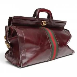 Gucci burgundy leather travel bag, circa 80s – kavel bij Veilinggebouw De Zwaan, Amsterdam