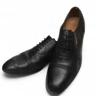 Gucci black leather brogue Oxford shoes, circa 00s – kavel bij Veilinggebouw De Zwaan, Amsterdam