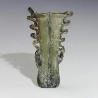 A Roman green glass double unguentarium, ca. 3rd - 4th century CE – kavel bij Veilinggebouw De Zwaan, Amsterdam