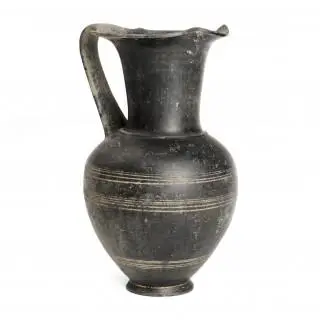 An Etruscan black terracotta Bucchero ewer, Oinochoe, ca. 7th century BCE – kavel bij Veilinggebouw De Zwaan, Amsterdam